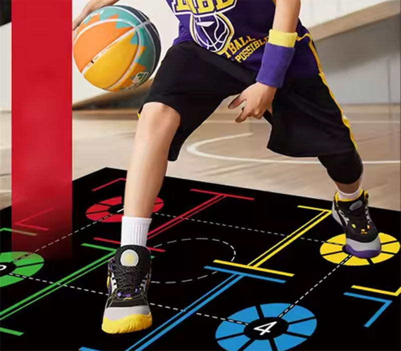 dribble according to the numbers and directional arrows placed on the basketball training mat